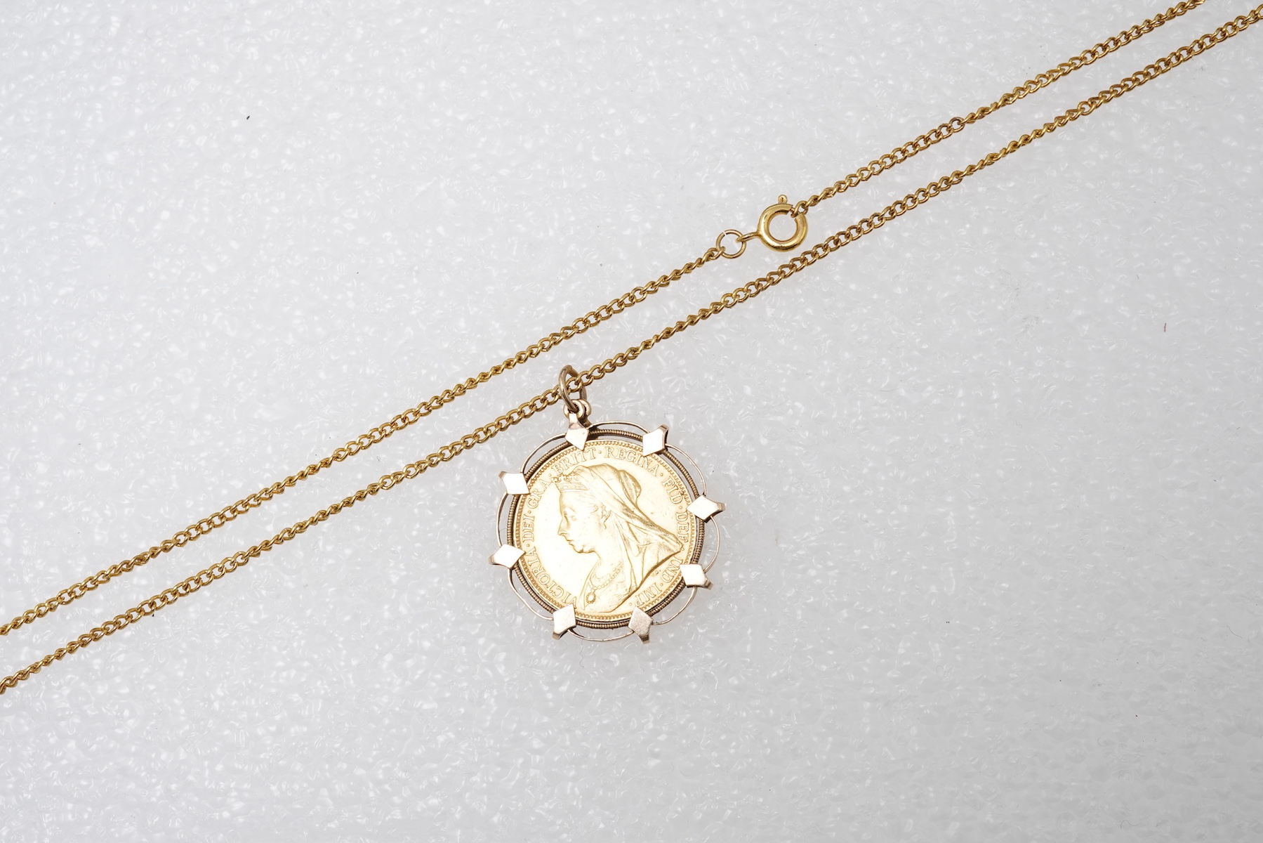 A Victorian sovereign coin pendant, circa 1898 and later